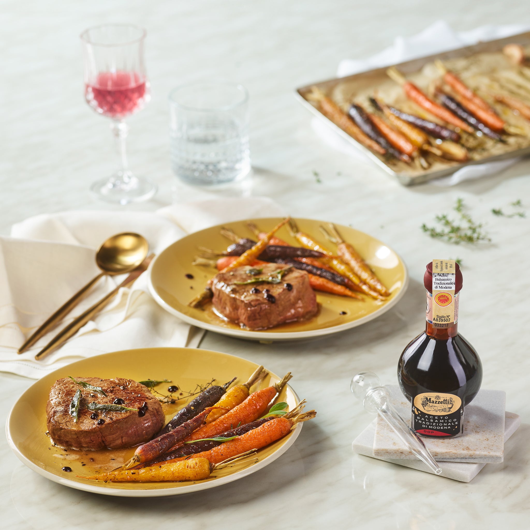 Beef fillet with baked coloured baby carrots and Tradizionale Balsamic Vinegar